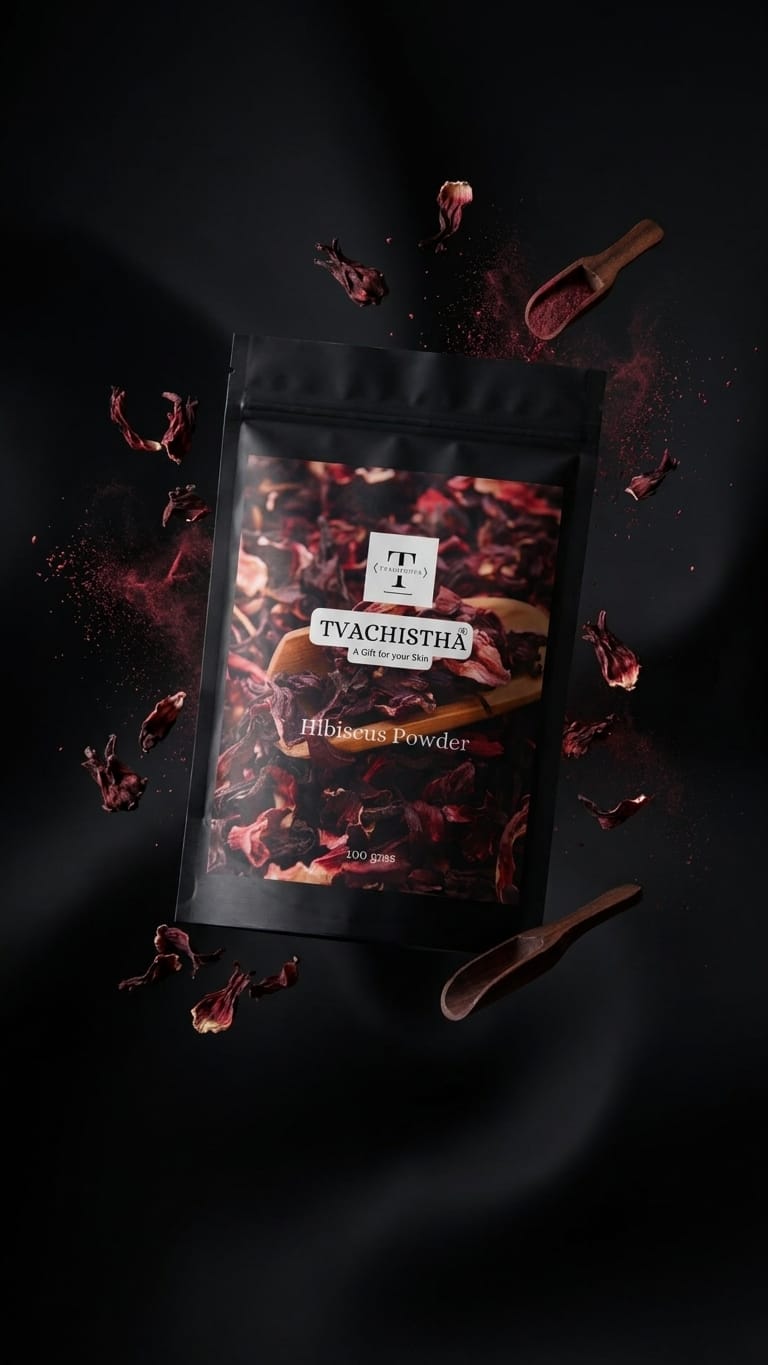 A premium black pouch of Tvachistha Pure Hibiscus Powder displaying its fine botanical texture for dual-action skin firming and hair conditioning.